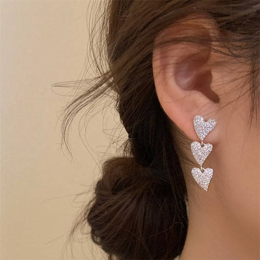 Aretes Tres Corazones Plateados con Circonias