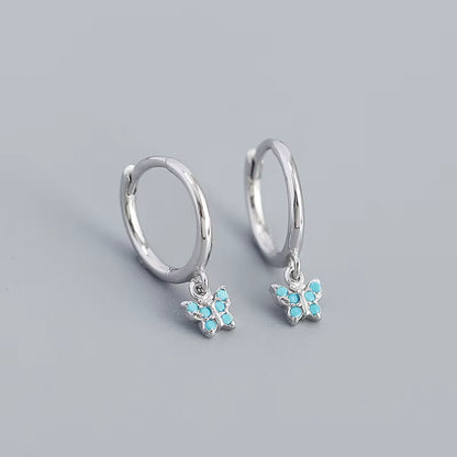 Arracadas con Mini Mariposa Colgante Turquesa