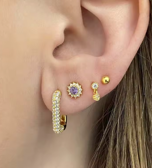 Stud Circular con Circionias y Piedra Lila en el Centro